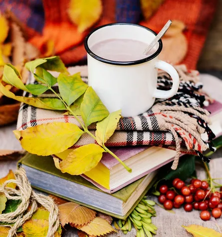 Coffee mug on books