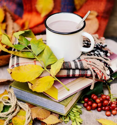 Coffee mug on books