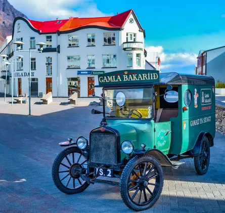 Vintage Car at Restaurant Entrance
