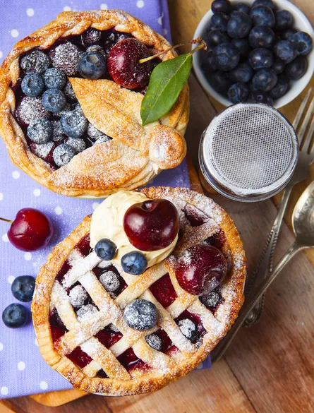 Two pies with cherries