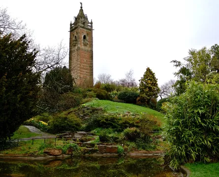 Stone building amidst trees