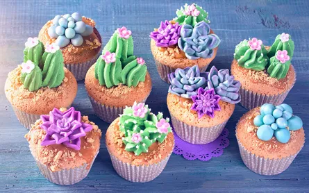 Purple flowers on cupcakes