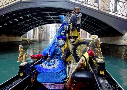 People riding boat on river