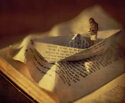 Miniature Figure in Paper Book