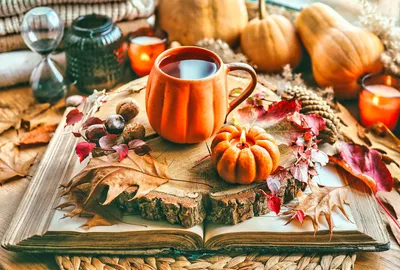 Pumpkin, mug of coffee, autumn leaves
