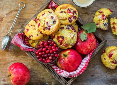 Apple pie with berries on table