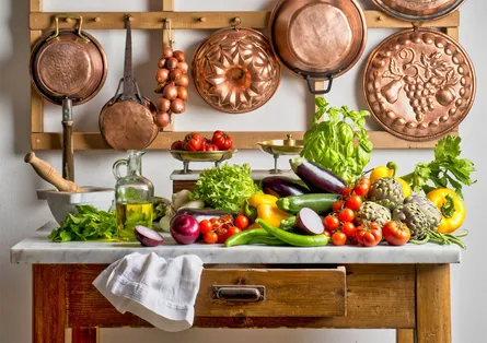 Wooden shelf of pots and pans