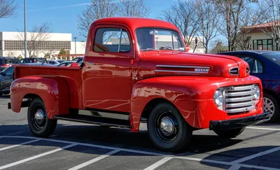 Red Truck Parked in Lot