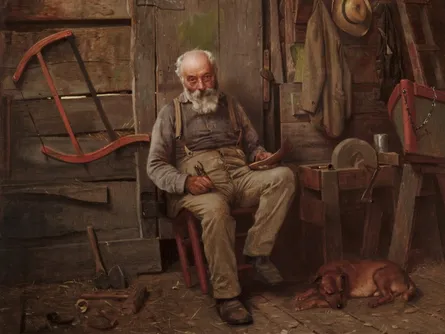 Old man sitting in workshop