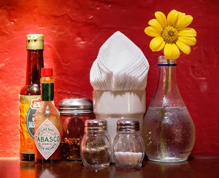 Food on table, condiments nearby