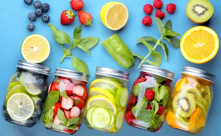 Colorful fresh fruit juice jars