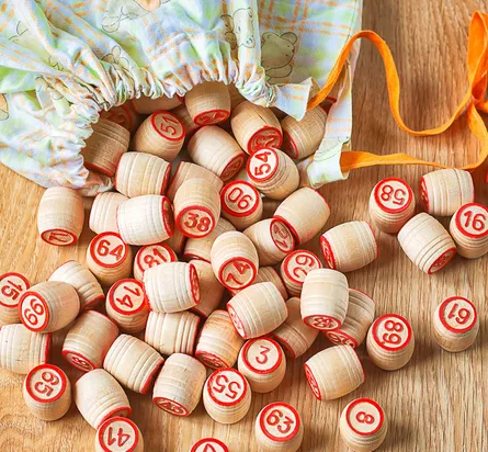 Ribbon near wooden lottery balls