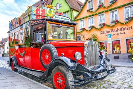 Red Carriage in Village
