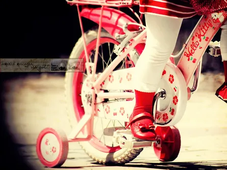 Little girl on bike