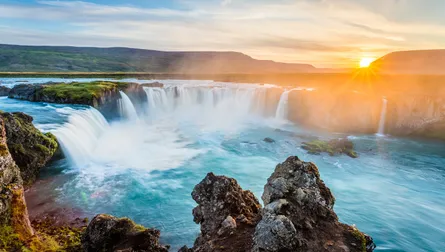 Sunset over waterfall