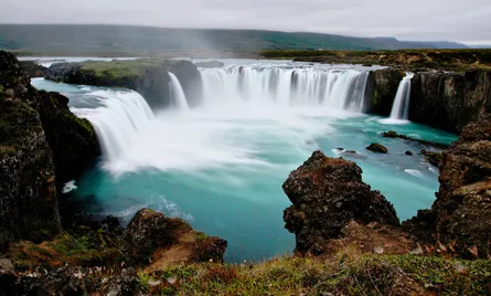 Waterfall next to river