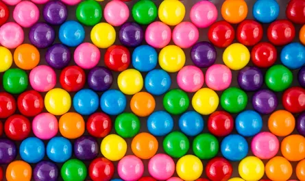 Colorful candy balls on table
