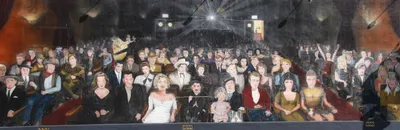 Group of people watching movie in theater