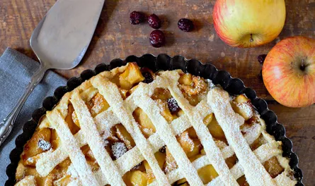 Fruit pie with crust on board