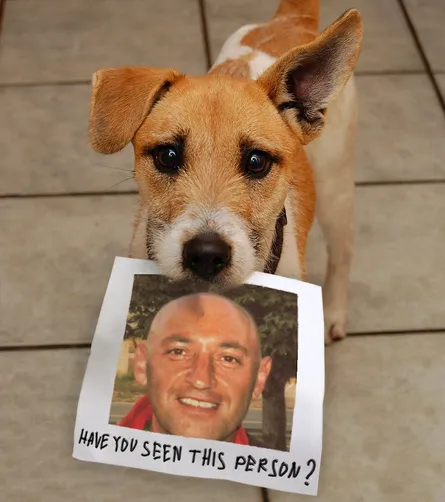 Dog with Picture of Man