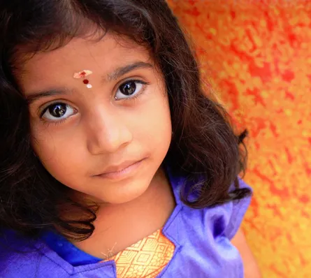 Little girl smiling at camera