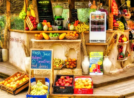 Fruit stand with sign