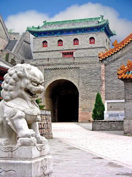 Lion statue in front of building