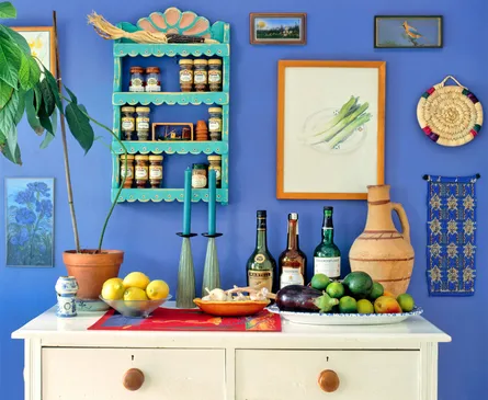 Colorful spice rack against wall