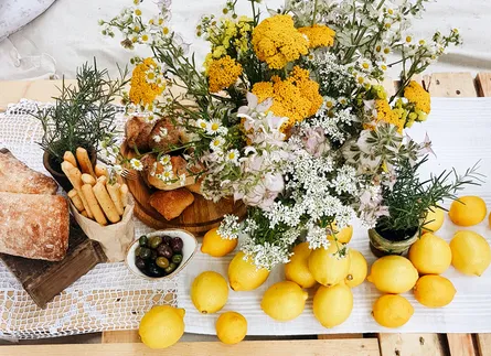 Yellow flowers and lemons