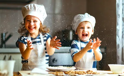 Children playing with flour