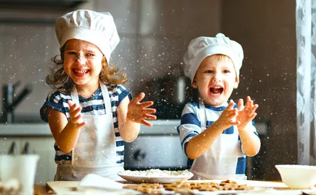 Children playing with flour