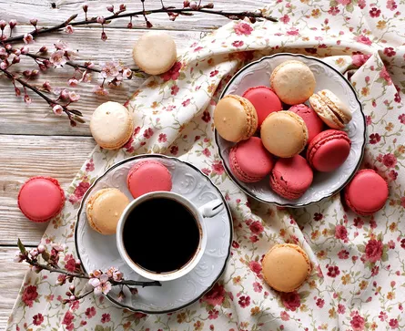 Coffee and macarons on a table