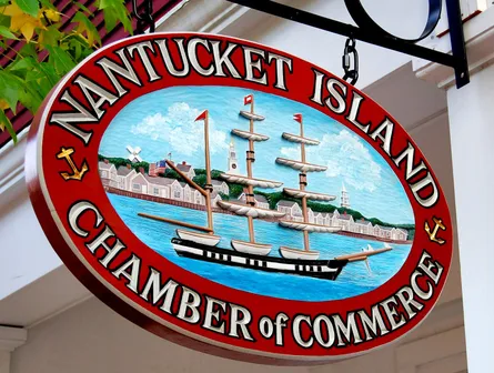The sign says nantucket island chamber of commerce