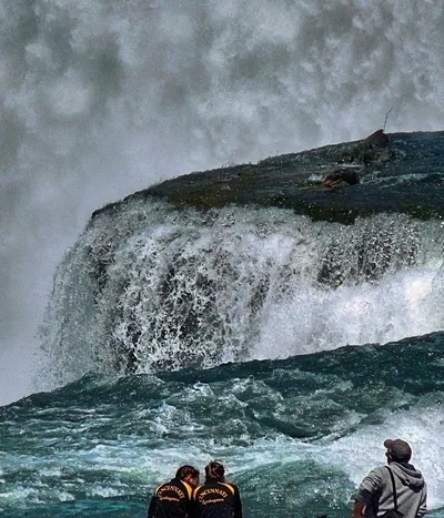 People near waterfall