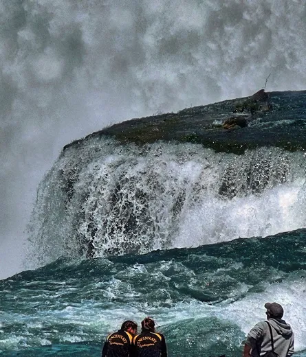 People near waterfall