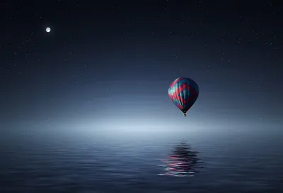 Hot air balloon floating on water