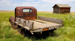 Old rusty truck, old weathered shed