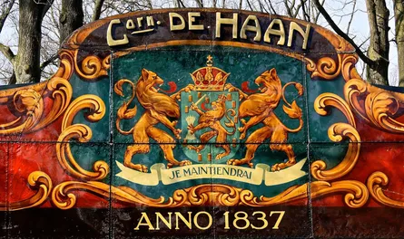 Sign says "Cat de Haan"