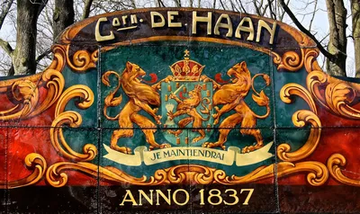 Sign says "Cat de Haan"