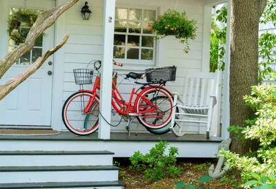 Bicycle parked in front of house