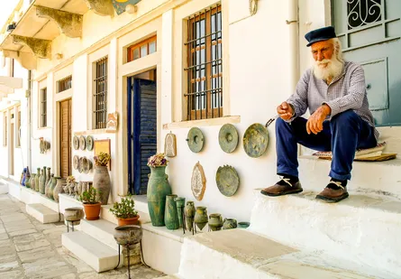 Old man sitting on steps