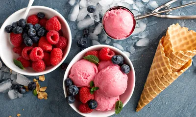 Three scoops of raspberry ice cream