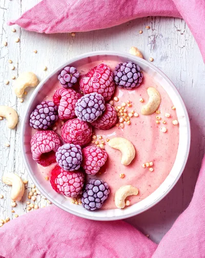 Raspberries with nuts on top