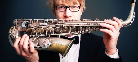 A musician holding his instrument