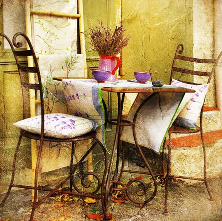 Table and chairs with flowers