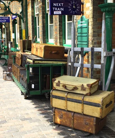 Old Suitcases on Platform