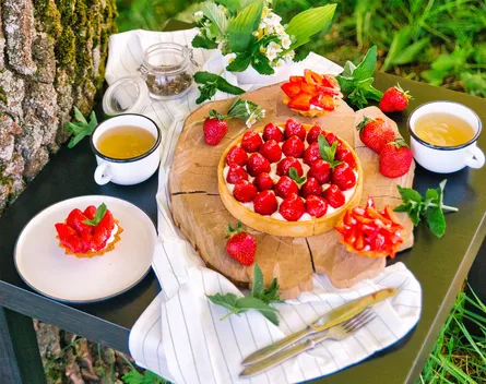 Strawberry shortcake, cake with strawberries on table