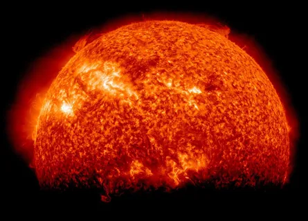 Bright sun against red background