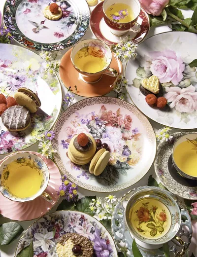 Assorted tea sets on a table