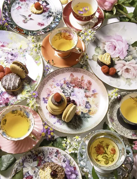 Assorted tea sets on a table